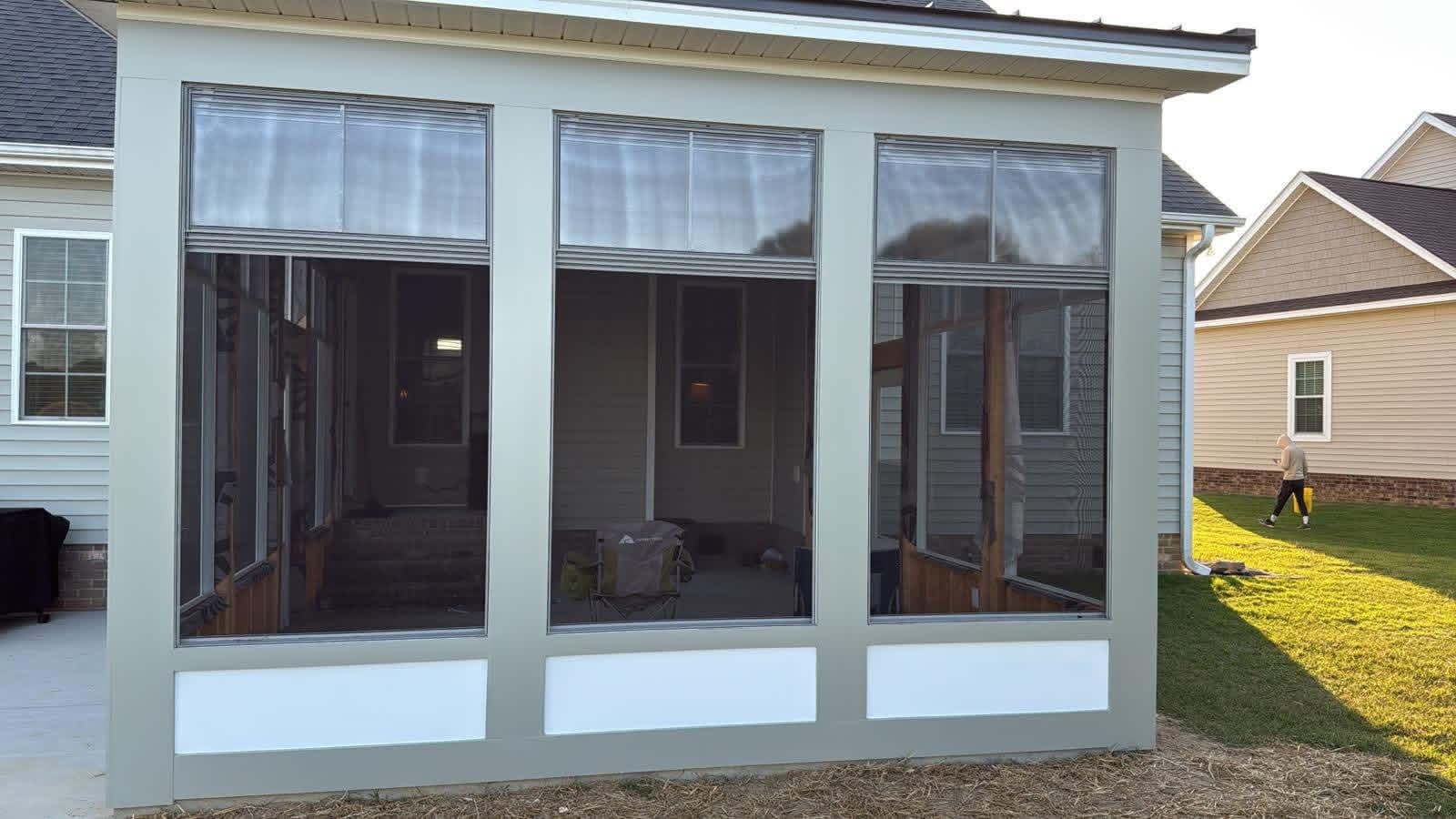 Freshly painted screened porch enclosure — front elevation by Tacho Painting LLC